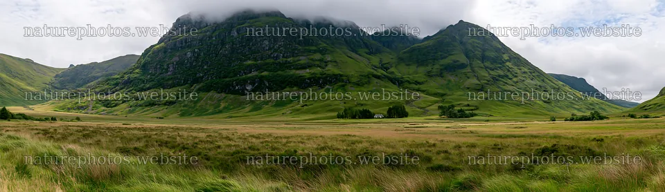 Meadow under crags in a mountain landscape – nature photos 14762x4268