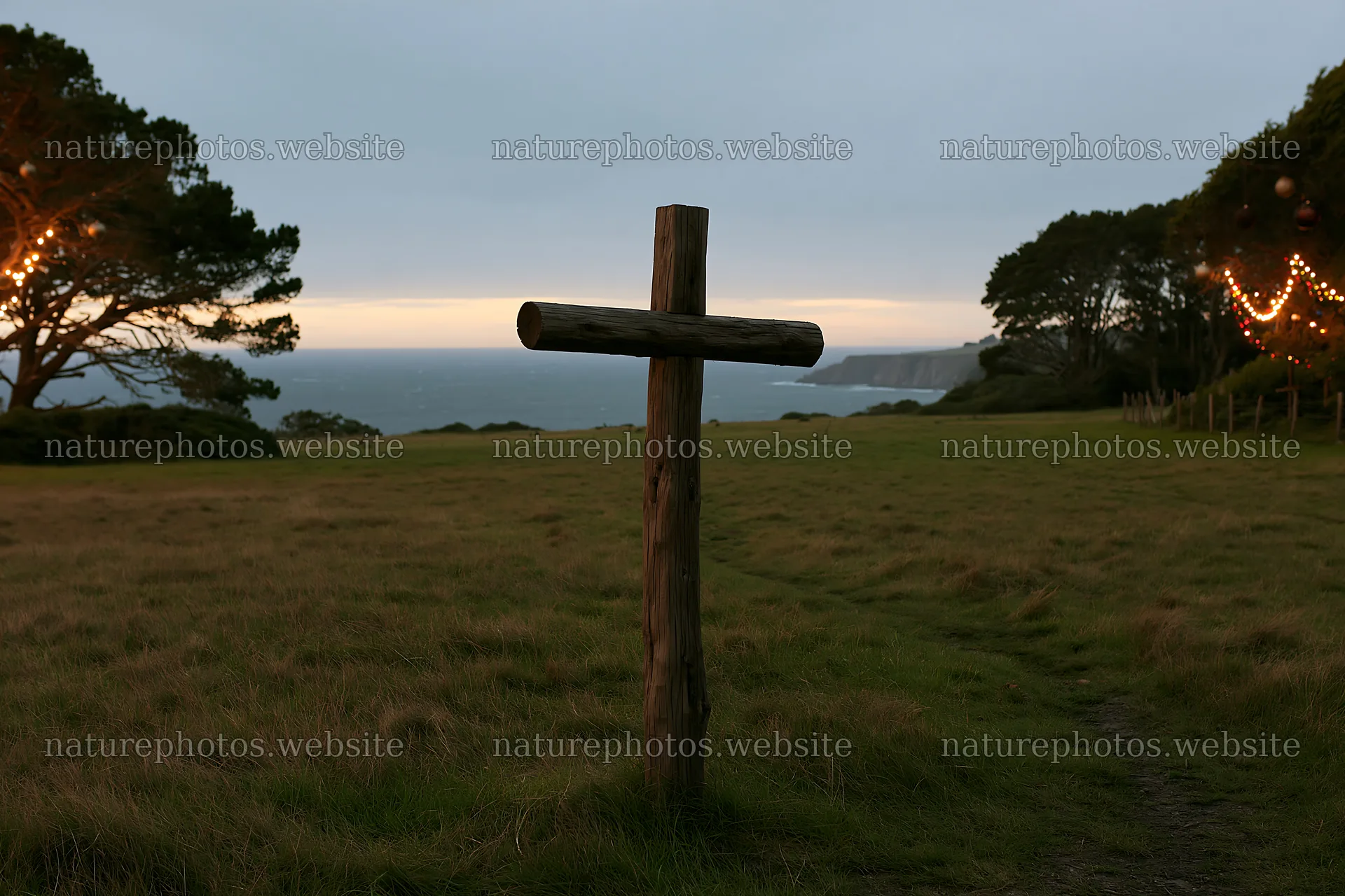 Cross in a meadow with ocean view at sunset – nature photos 9722x6480