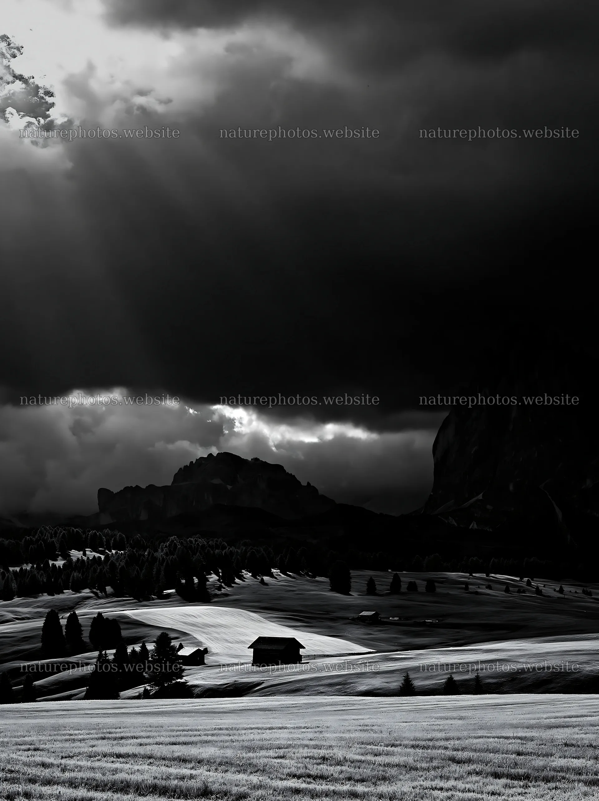 Alpe di Siusi meadow sunbeams break through dark clouds – nature photos 6866x9174