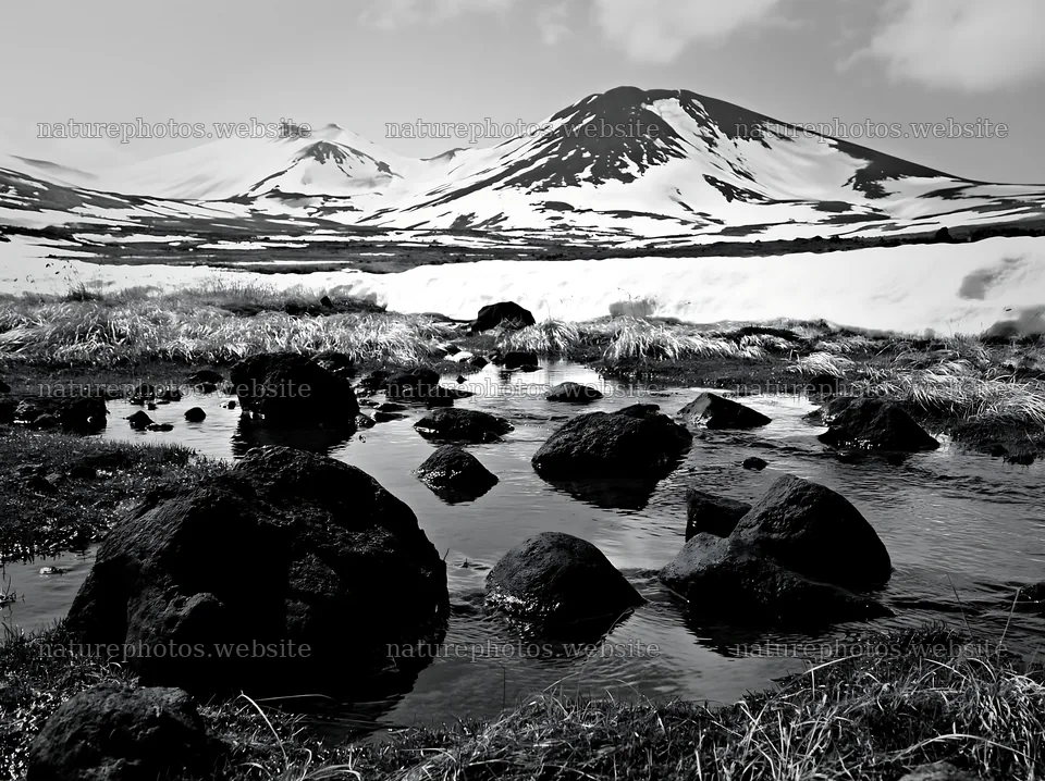 Akita snowmelt meadow with silver grasses and rocky water – nature photos 9174x6866