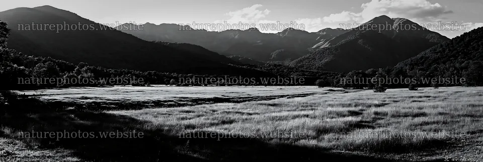 French meadow below Pyrenees range with mountains in the background – nature photos 13690x4602